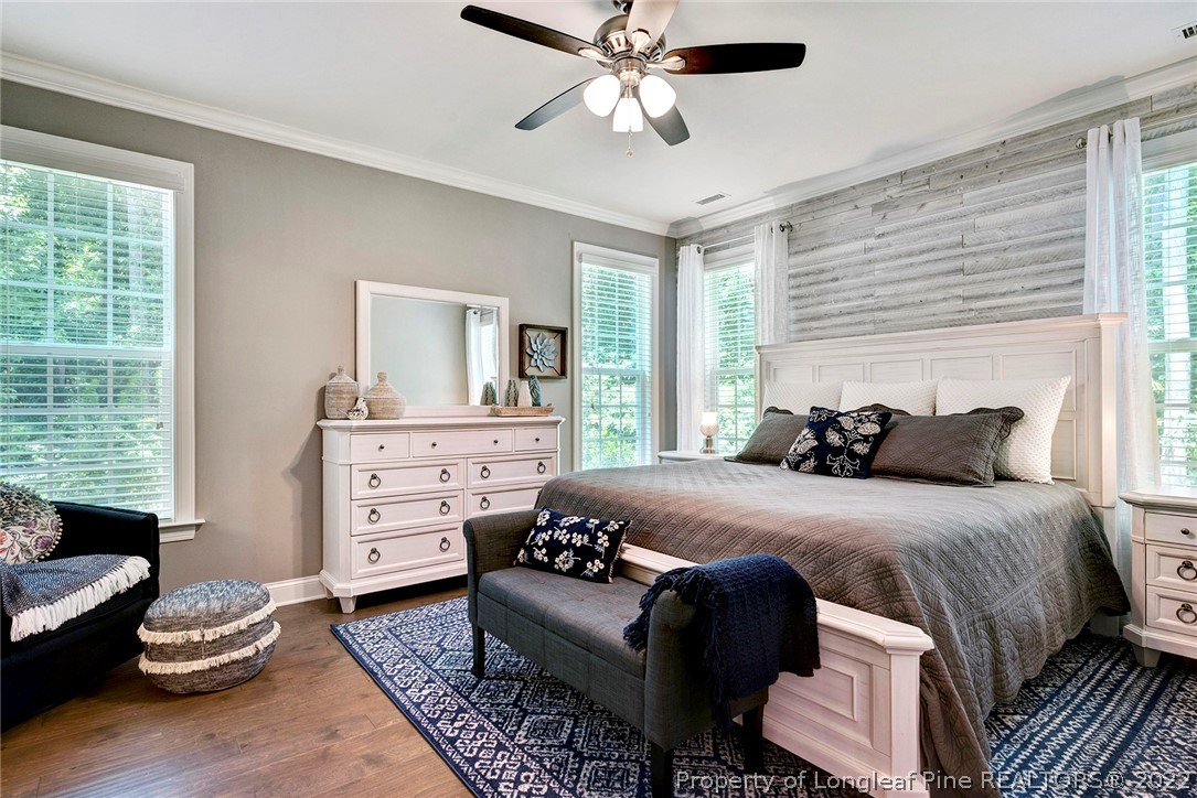 4139 Olde Judd Drive Willow Spring, NC 27592 - Photo 22 of 42 a bedroom with a bed and a window