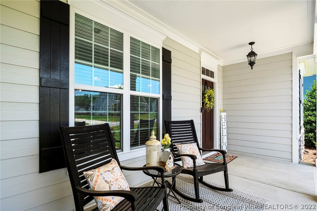 4139 Olde Judd Drive Willow Spring, NC 27592 - Photo 4 of 42 a view of a balcony with chairs