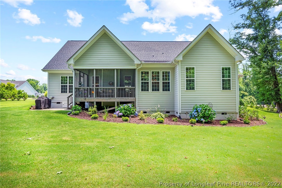 4139 Olde Judd Drive Willow Spring, NC 27592 - Photo 42 of 42 a front view of a house with garden