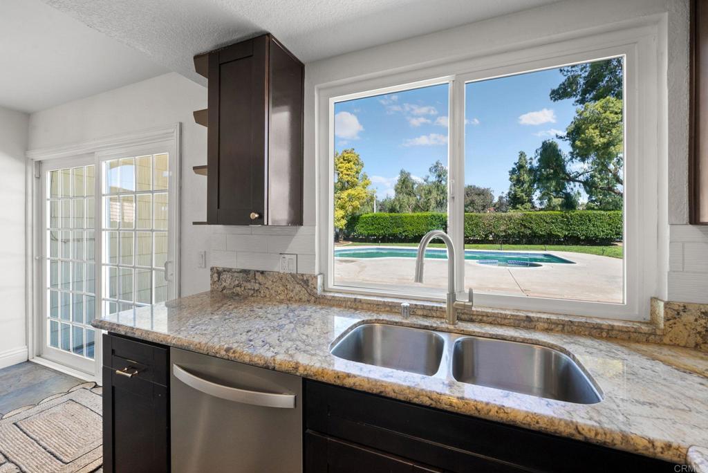 41910 Humber Drive Temecula, CA 92591 - Photo 14 of 40 a kitchen sink sitting next to a window