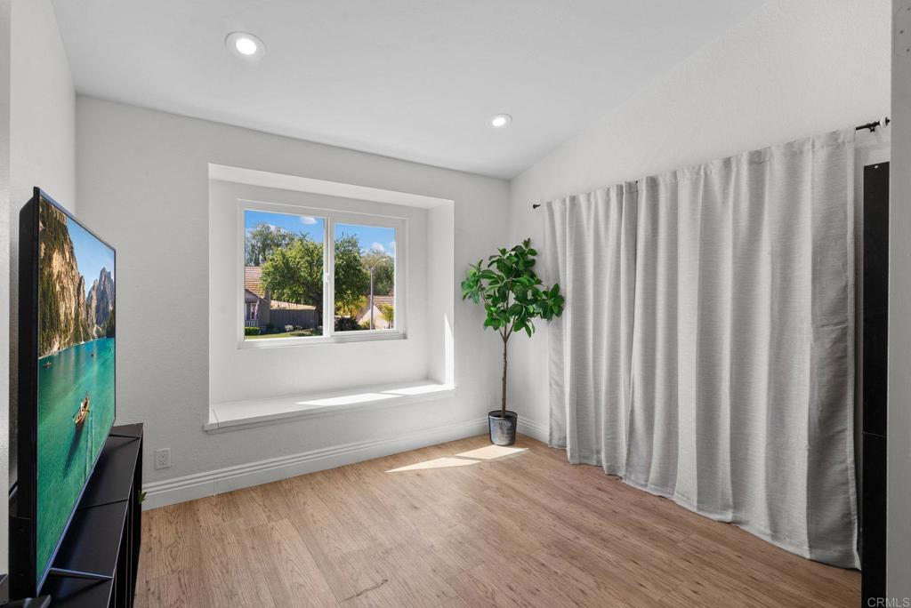 41910 Humber Drive Temecula, CA 92591 - Photo 26 of 40 a view of wooden floor and a window in a room