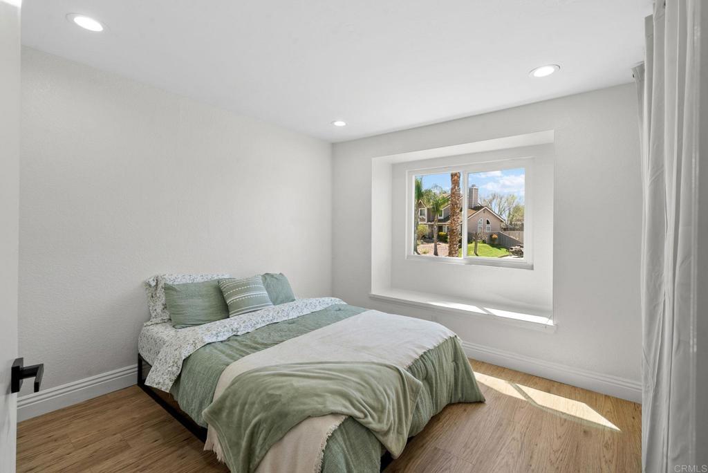 41910 Humber Drive Temecula, CA 92591 - Photo 27 of 40 a bedroom with a bed and a window