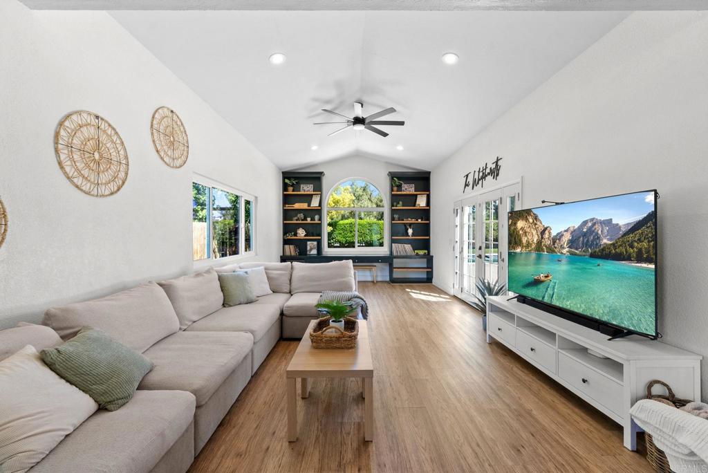 41910 Humber Drive Temecula, CA 92591 - Photo 3 of 40 a living room with furniture and a flat screen tv