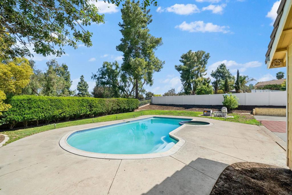 41910 Humber Drive Temecula, CA 92591 - Photo 34 of 40 a view of a swimming pool with a yard