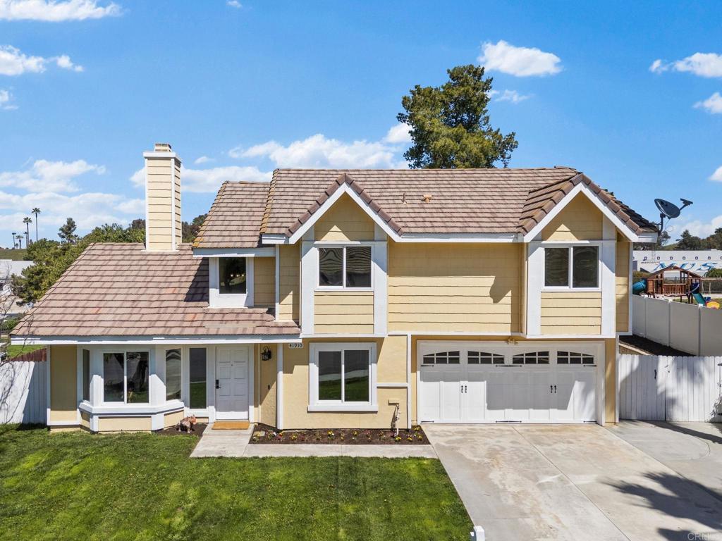 41910 Humber Drive Temecula, CA 92591 - Photo 7 of 40 a view of a house with a swimming pool