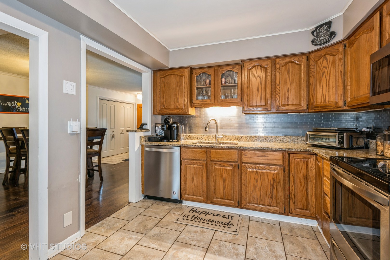 9622 West Higgins Road, Unit 2DS Rosemont, IL 60018 - Photo 7 of 14 a kitchen with a sink stove and refrigerator