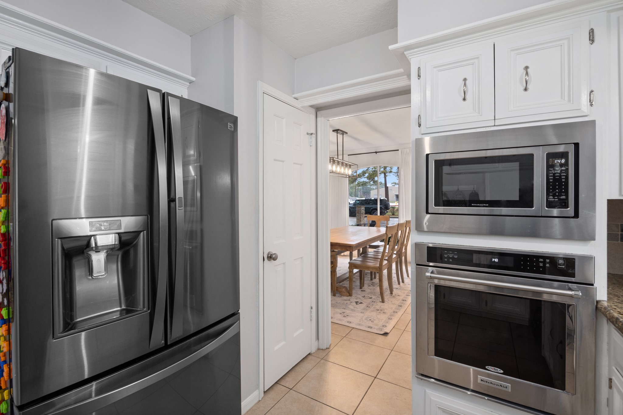 9123 Herts Road Spring, TX 77379 - Photo 18 of 40 A view from the kitchen into the dining room.