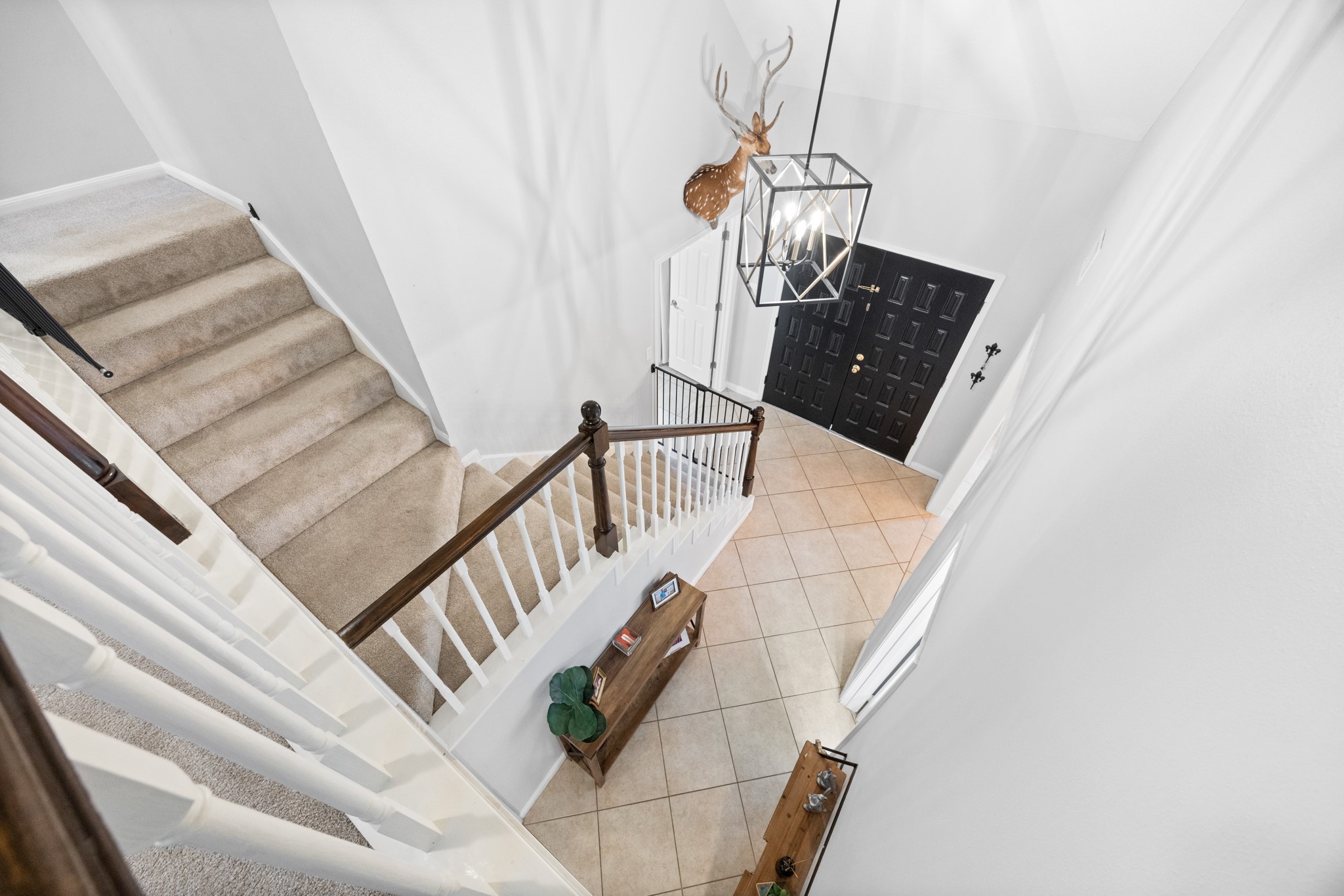 9123 Herts Road Spring, TX 77379 - Photo 28 of 40 Up the stairs to the second floor.