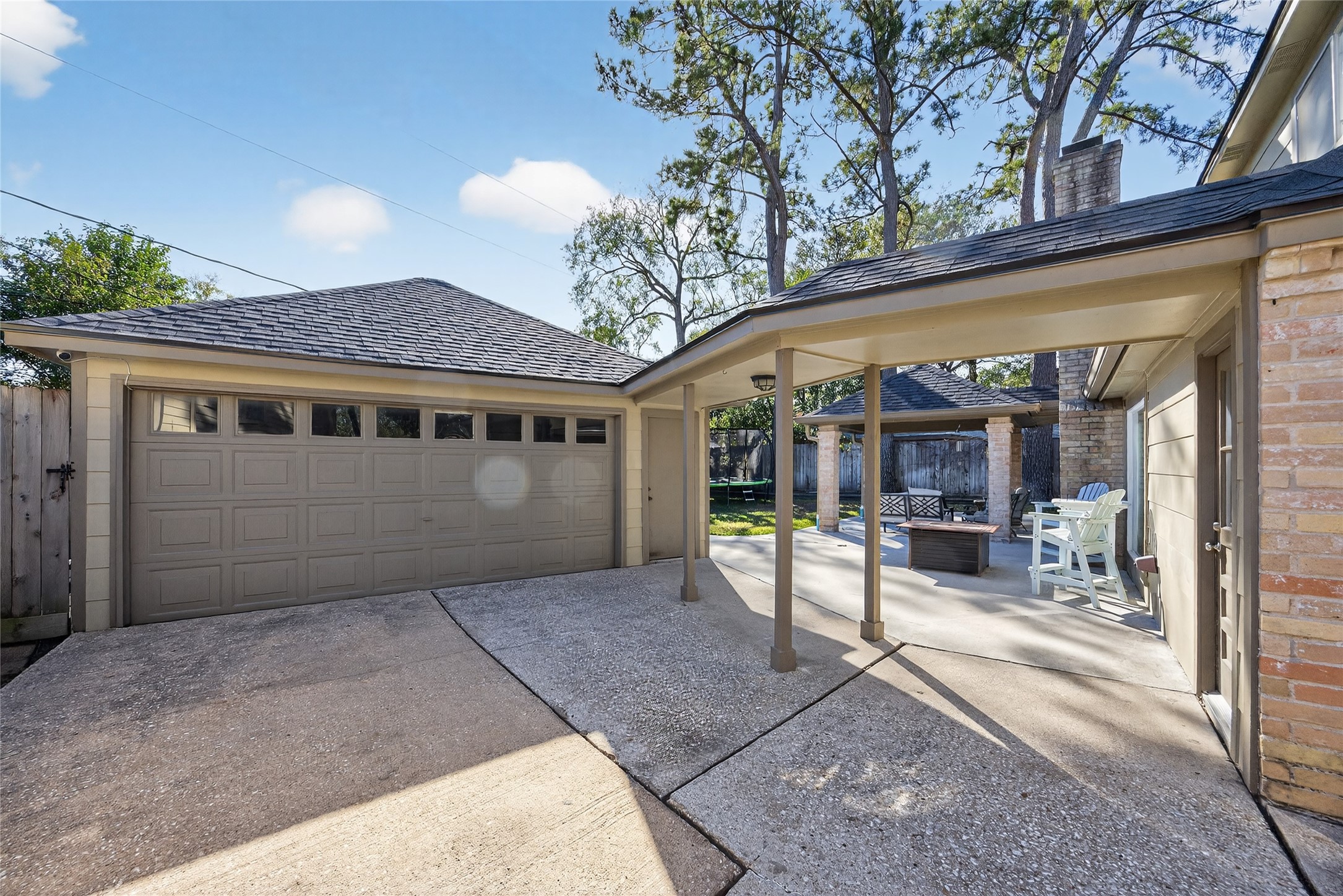 9123 Herts Road Spring, TX 77379 - Photo 34 of 40 The gated driveway ends at the detached garage and offers a great safe space for kids to play.
