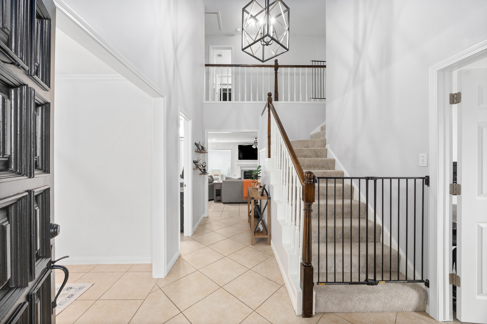 9123 Herts Road Spring, TX 77379 - Photo 4 of 40 Just inside the double front doors you are greeted by a 2 story entry offering access to the office & dining room.