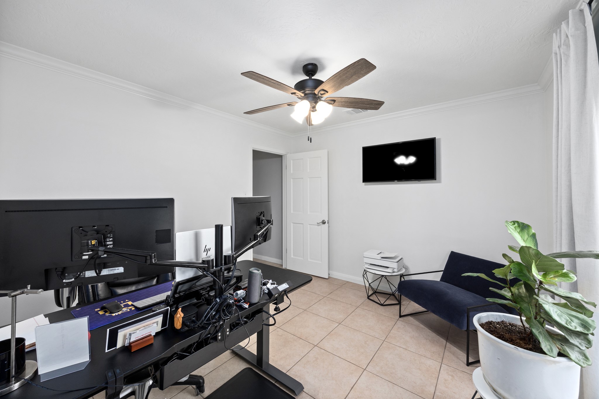 9123 Herts Road Spring, TX 77379 - Photo 6 of 40 At the front of the home is the office featuring tile floors and ample natural light.