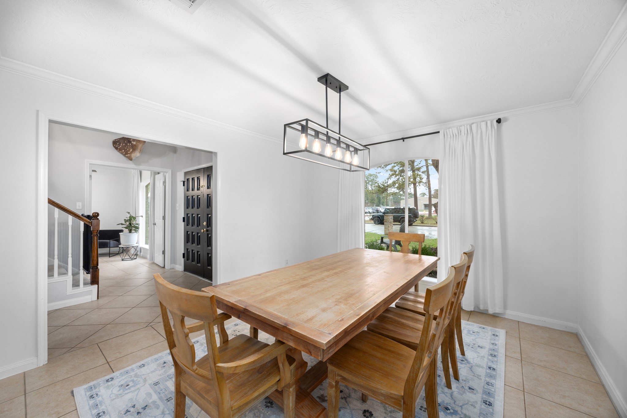 9123 Herts Road Spring, TX 77379 - Photo 10 of 40 The dining room conveniently connects to the kitchen as well as the entry