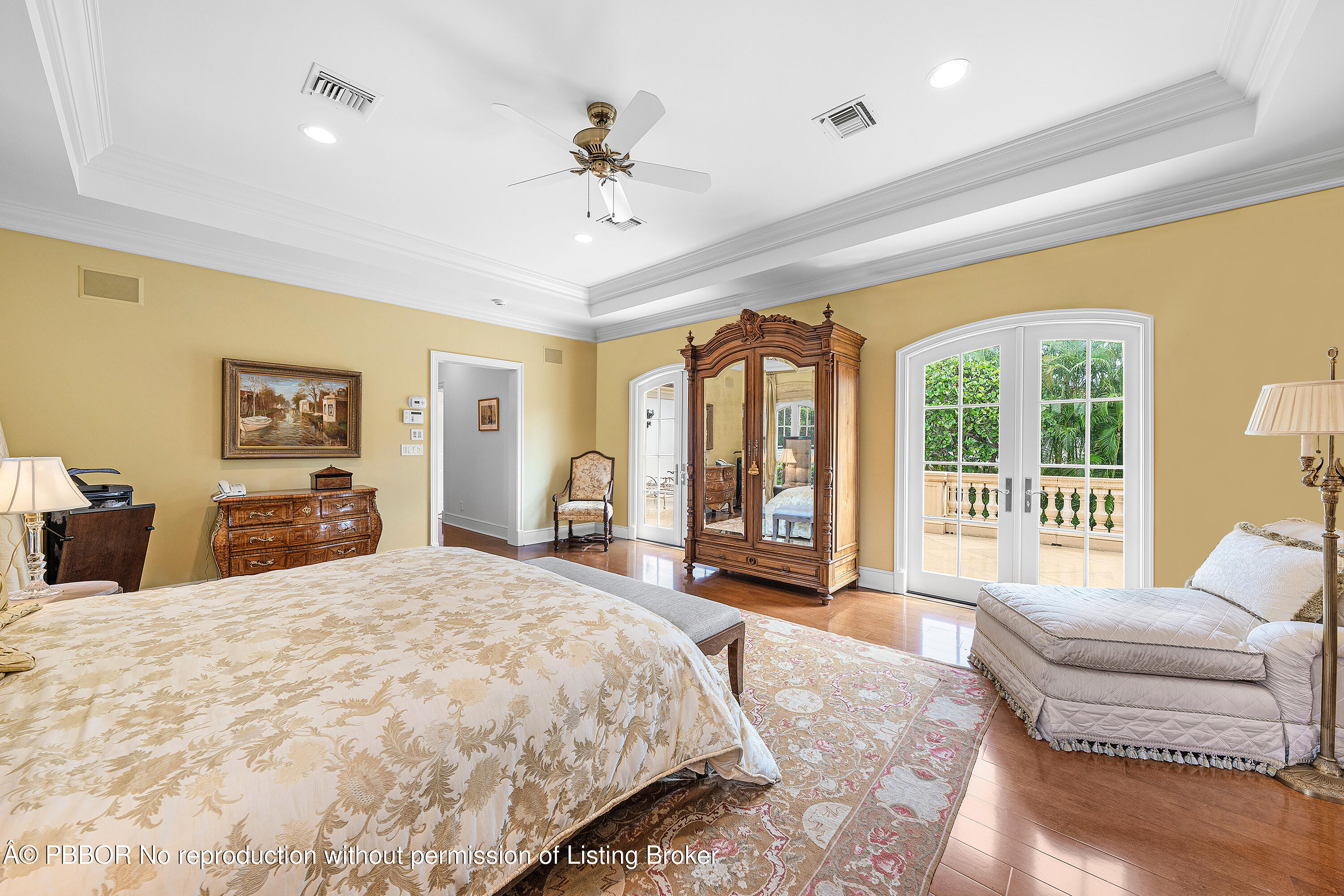 242 Wells Road Palm Beach, FL 33480 - Photo 23 of 54 a spacious bedroom with a large bed and a large window
