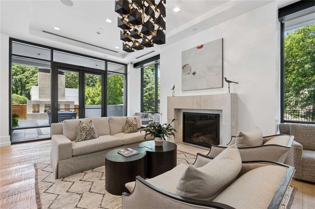 2520 Peachtree Road, Unit 603 Atlanta, GA 30305 - Photo 69 of 91 a living room with furniture and a fireplace