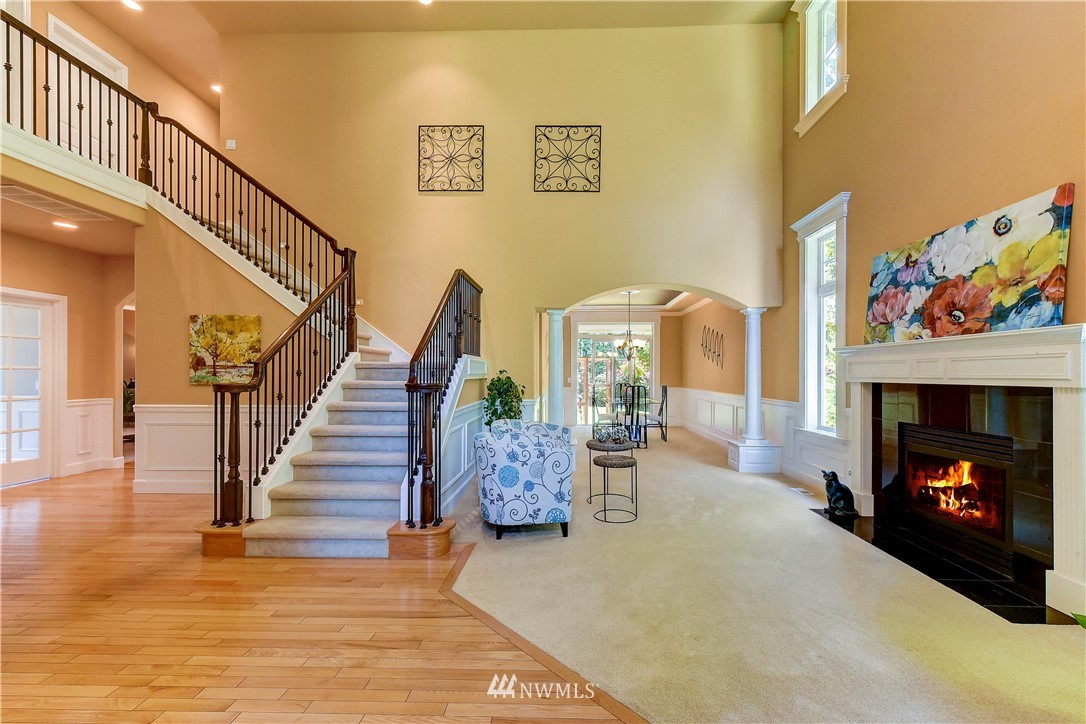 3704 Maple Road Lynnwood, WA 98037 - Photo 2 of 30 a living room with furniture and a fireplace