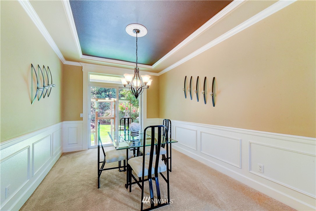 3704 Maple Road Lynnwood, WA 98037 - Photo 5 of 30 a view of a dining room with furniture and chandelier