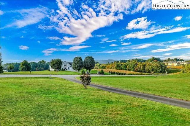 a view of a patio with a table chairs and a patio