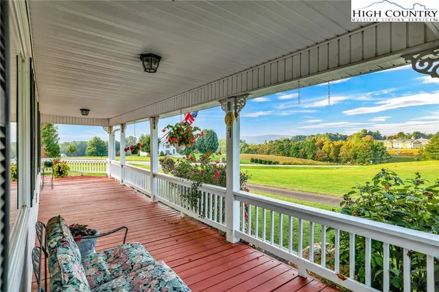 a view of a house with a big yard