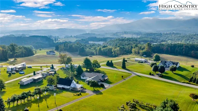 a view of a swimming pool with a garden