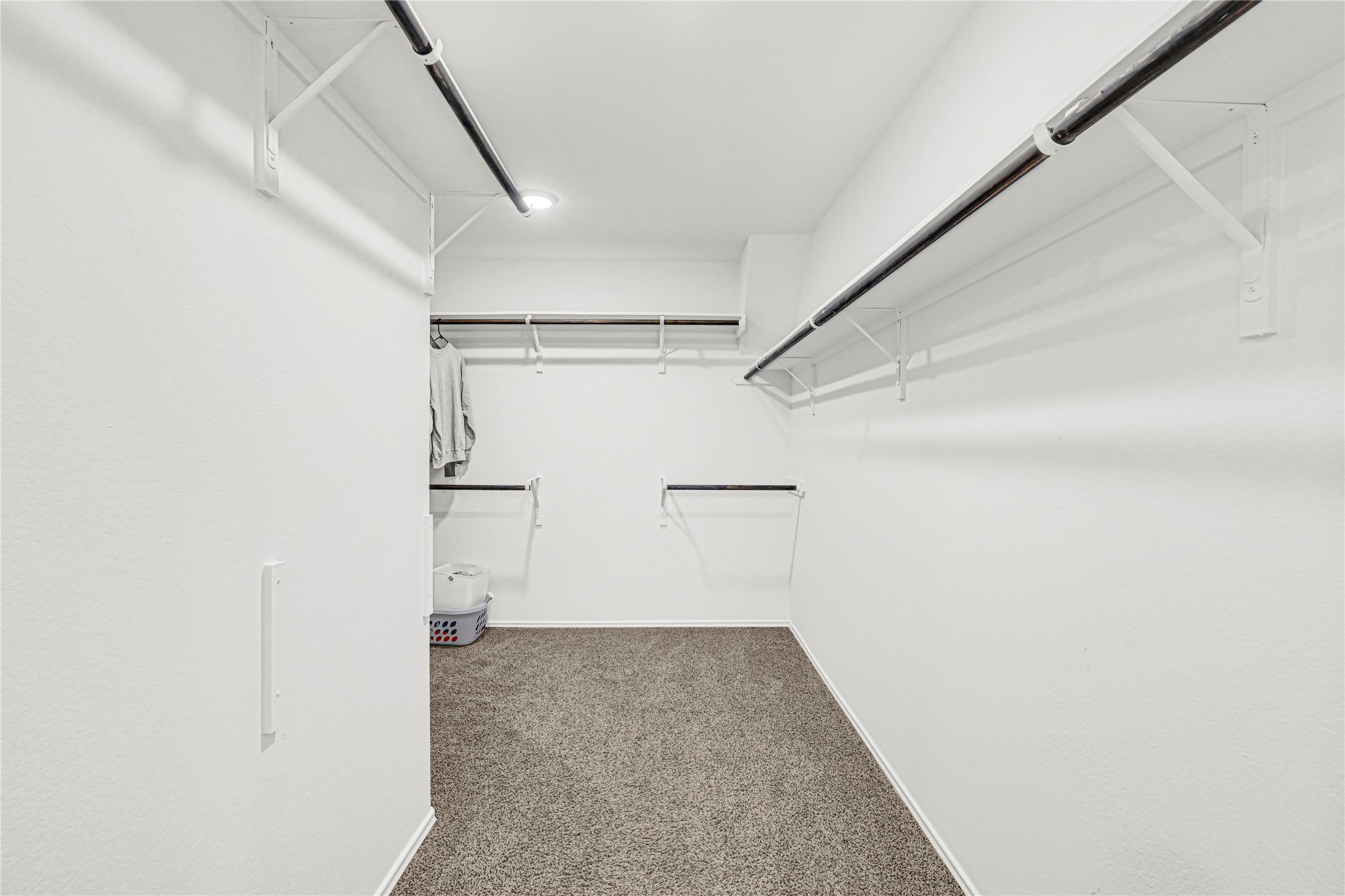 23343 Dukes Run Drive Spring, TX 77373 - Photo 13 of 21 a view of a room with empty racks