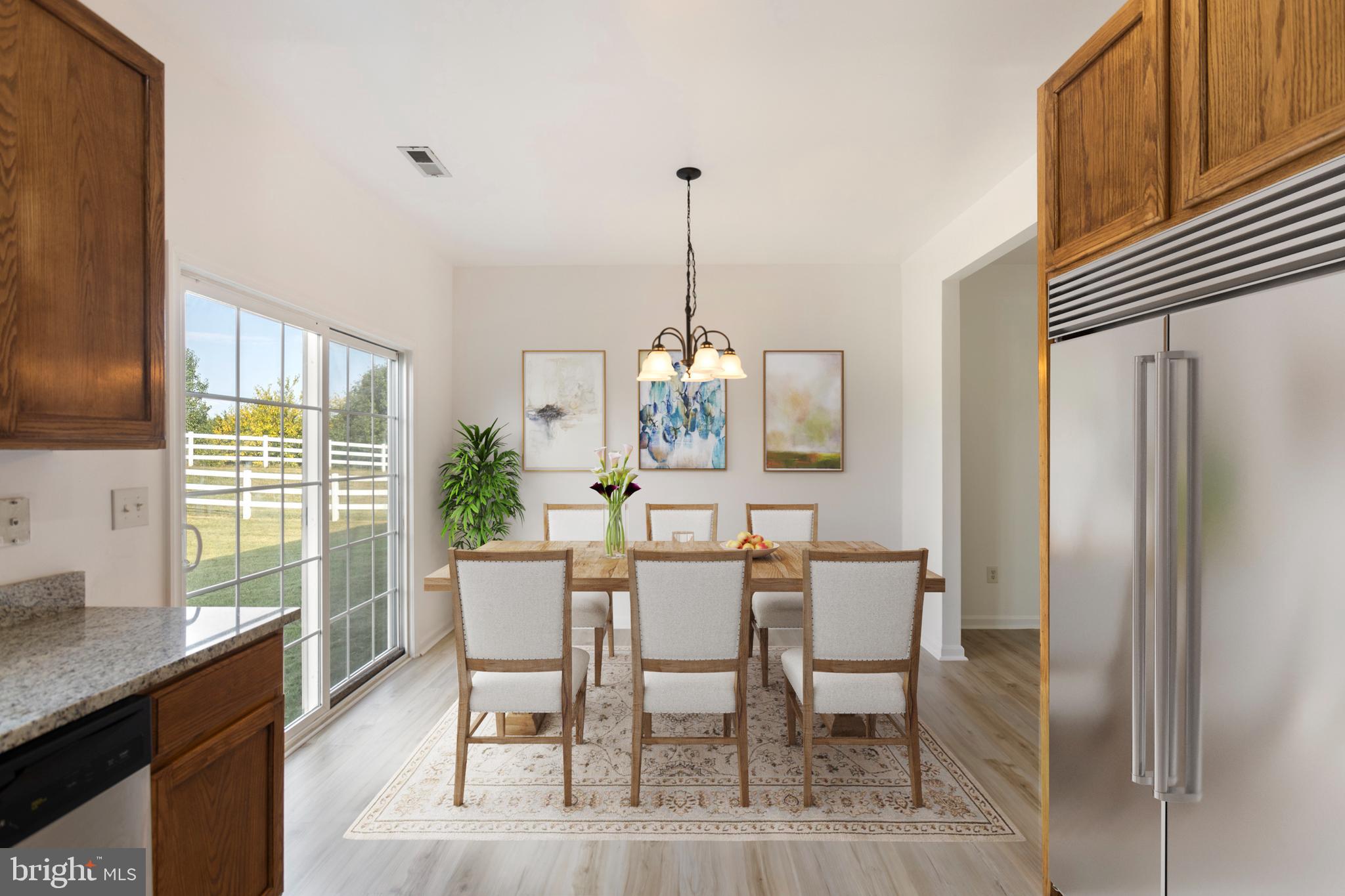 62 Springfield Circle Middletown, DE 19709 - Photo 14 of 48 Virtually Staged Dining Area and Kitchen