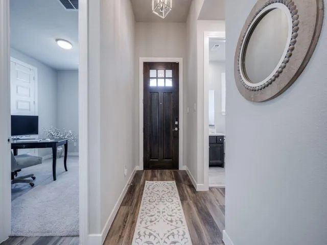 a view of a hallway with elevator