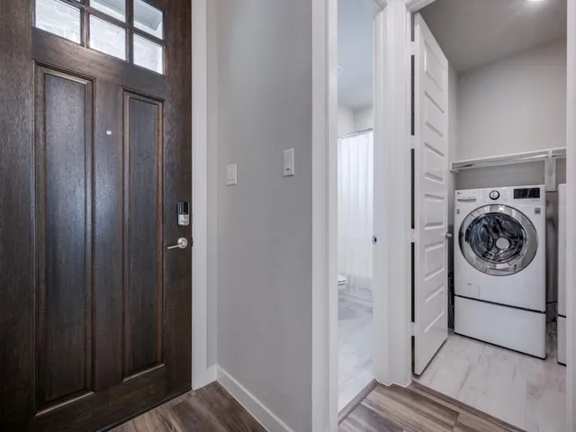 a utility room with washer and dryer