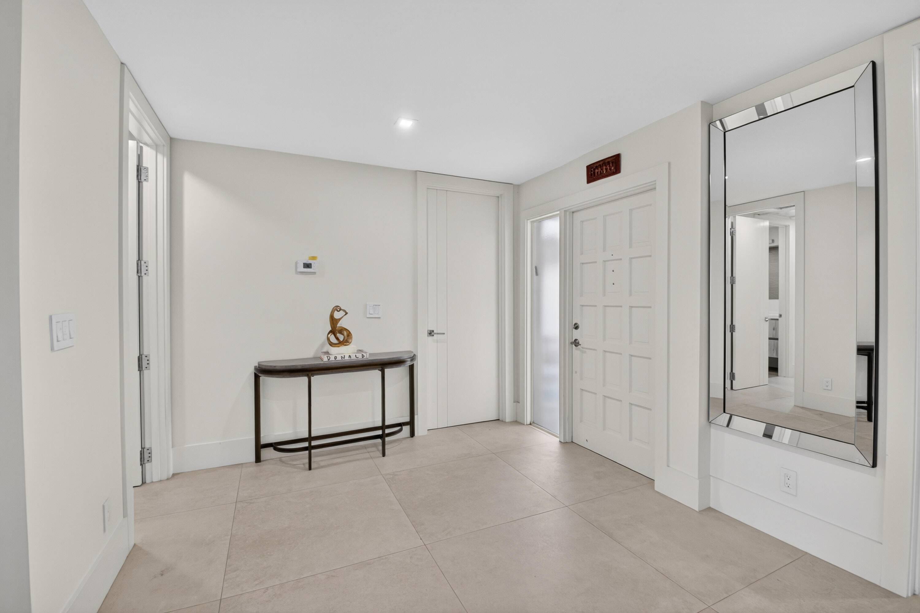 403 Bridgewood Court, Unit 403 Boca Raton, FL 33434 - Photo 3 of 62 FOYER