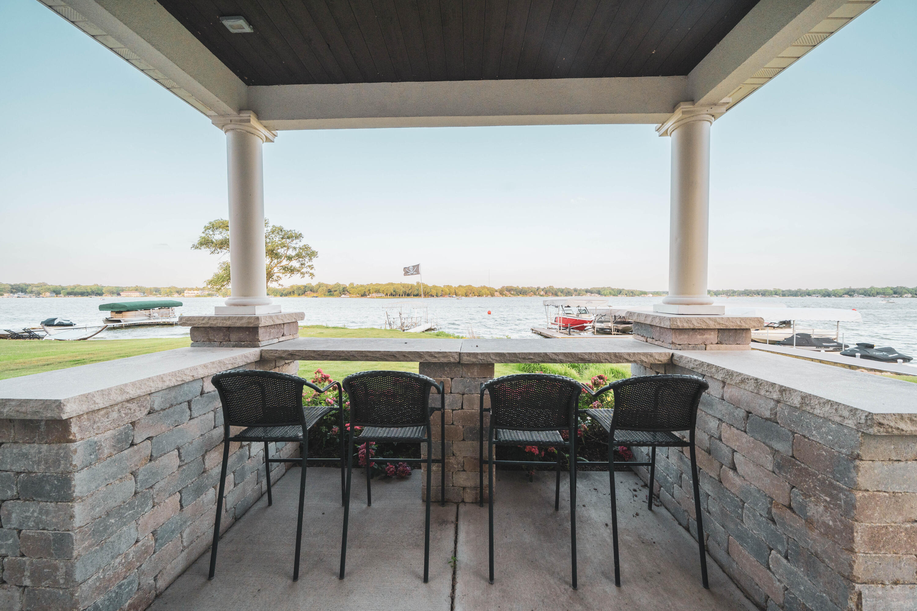 13941 Lakeview Point Road Cedar Lake, IN 46303 - Photo 56 of 64 a view of a dining room with a table and chairs next to a yard