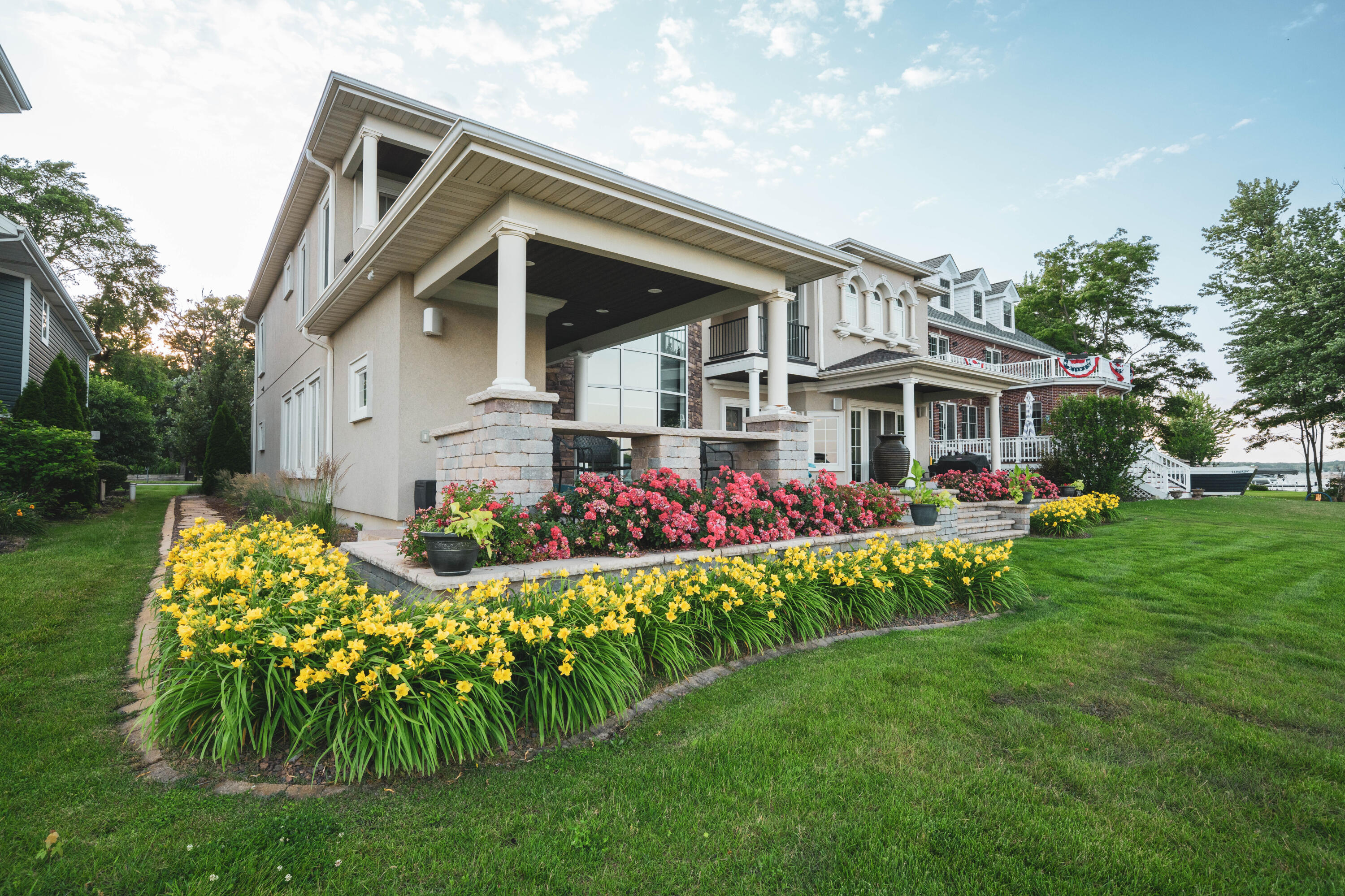 13941 Lakeview Point Road Cedar Lake, IN 46303 - Photo 59 of 64 a front view of a house with a garden and plants