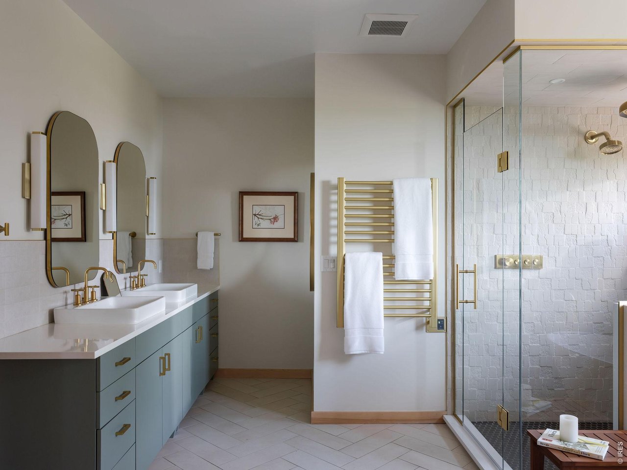 9773 Phillips Road Lafayette, CO 80026 - Photo 20 of 46 a bathroom with a double vanity sink a mirror and a shower