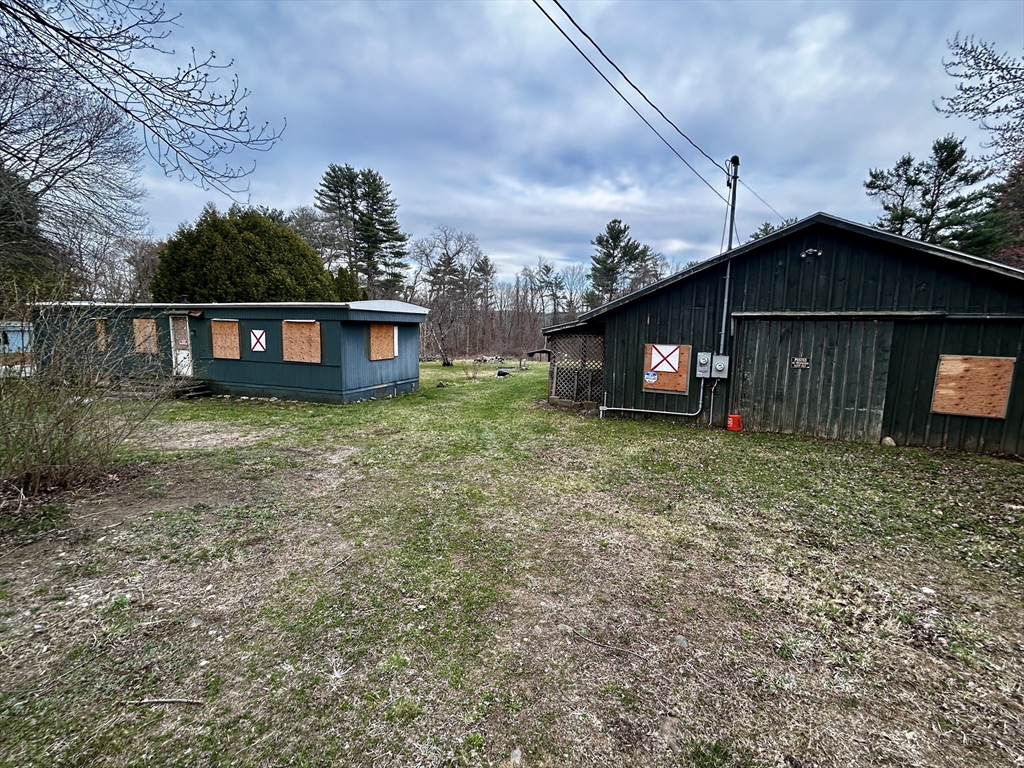 267 Osborne Road Ware, MA 01082 - Photo 2 of 10 a view of a house with a yard