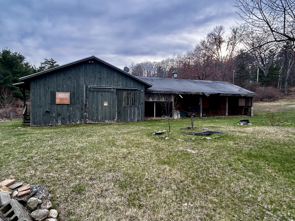 267 Osborne Road Ware, MA 01082 - Photo 5 of 10 a front view of a house with a yard