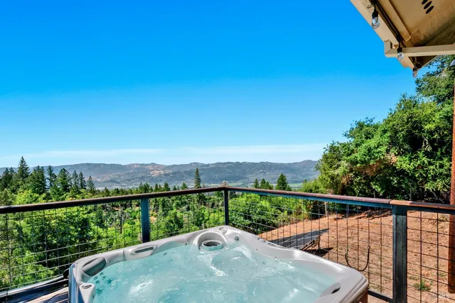 a balcony with an outdoor view