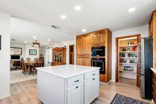a bedroom with a bed closet and window
