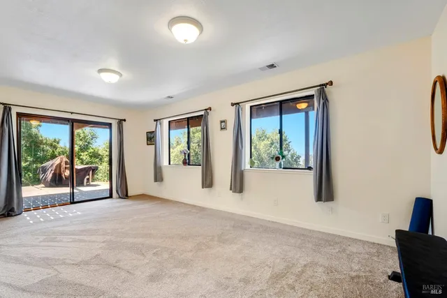 a house with trees in the background