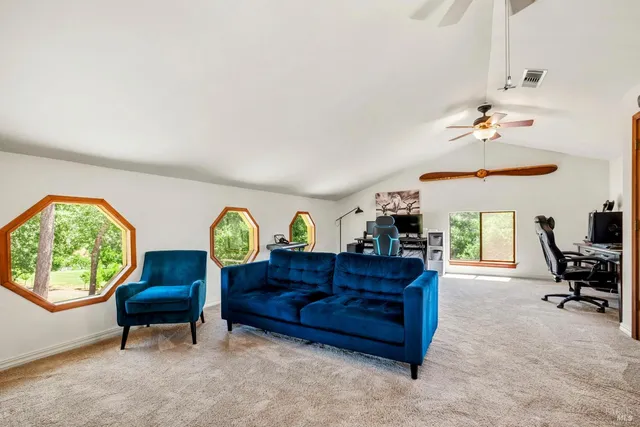 a backyard of a house with lots of green space