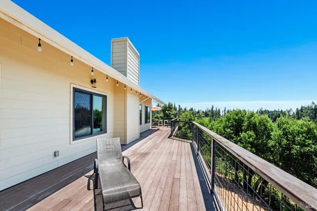 an aerial view of house with yard
