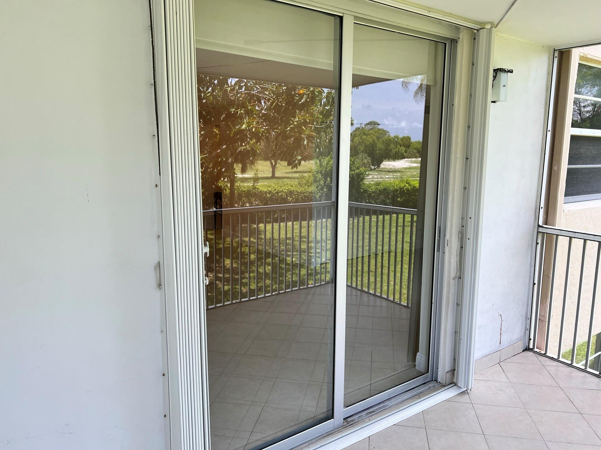 5700 Northwest 2nd Avenue, Unit 204 Boca Raton, FL 33487 - Photo 13 of 31 a view of a glass door