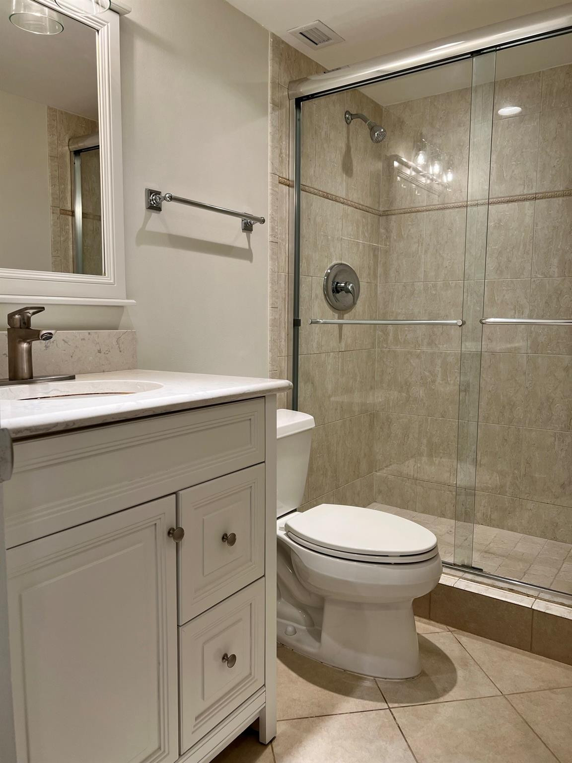5700 Northwest 2nd Avenue, Unit 204 Boca Raton, FL 33487 - Photo 17 of 31 a bathroom with a sink toilet and shower
