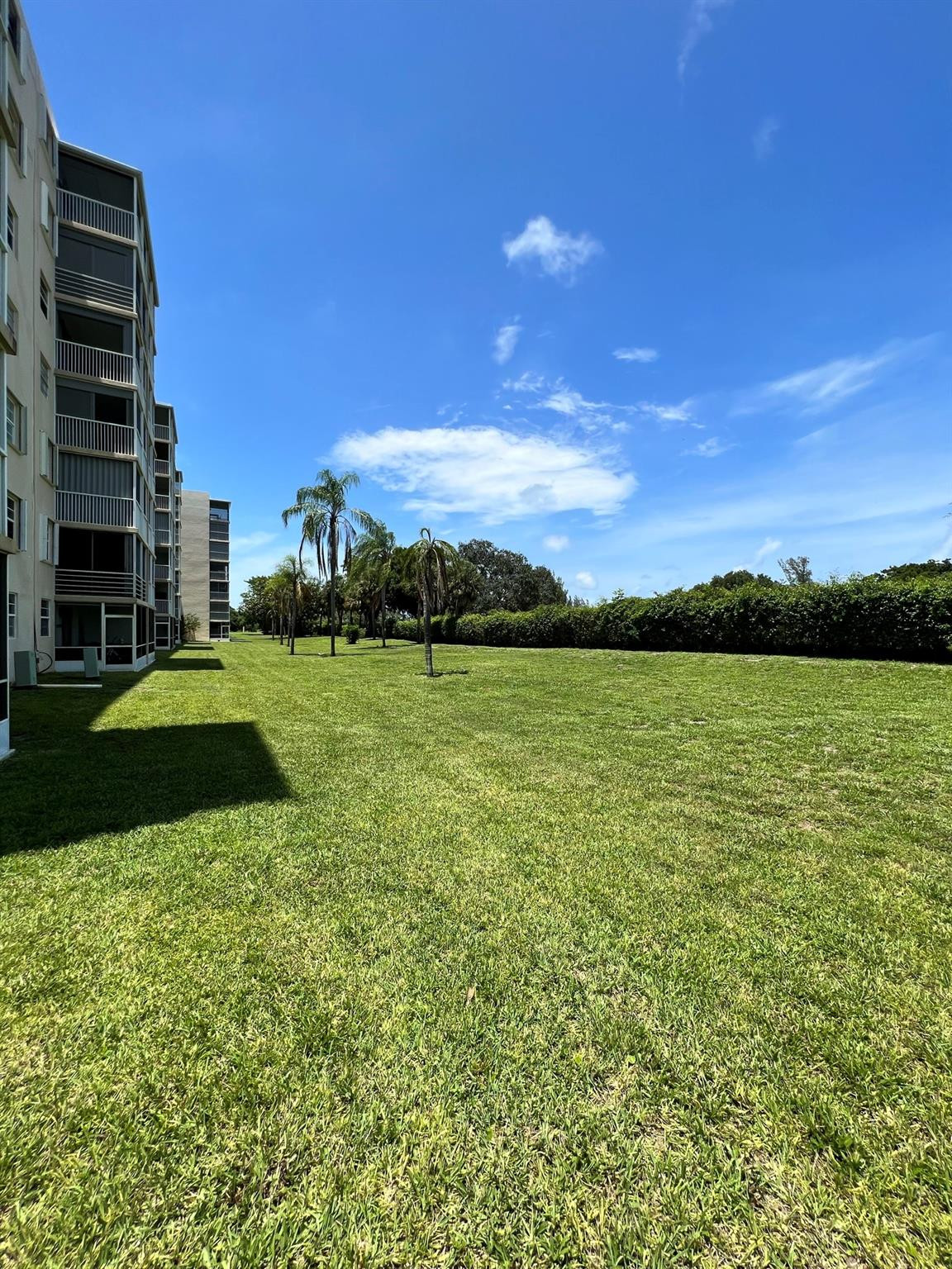 5700 Northwest 2nd Avenue, Unit 204 Boca Raton, FL 33487 - Photo 30 of 31 a view of a golf course with a lake