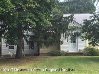 24 Heyers Mill Road Colts Neck, NJ 07722 - Photo 3 of 12 a view of a backyard