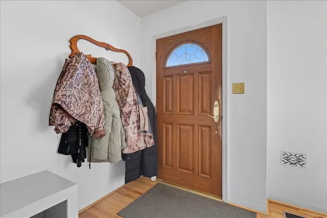 a view of staircase with a rug