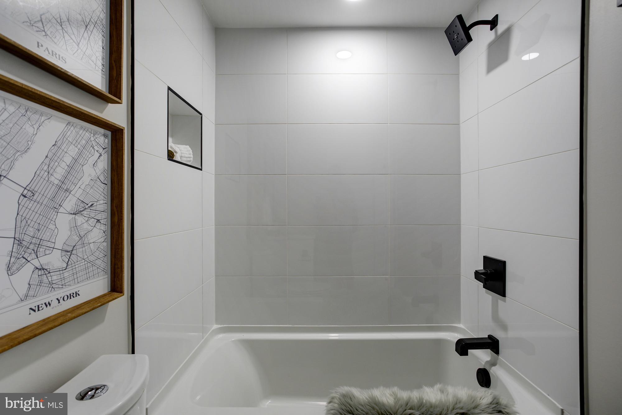 2301 Ontario Road Northwest, Unit 1 Washington, DC 20009 - Photo 10 of 15 with full tiled surround