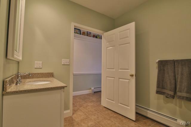 297 Meyer Road Nazareth, PA 18064 - Photo 21 of 41 a bathroom with a sink and a mirror