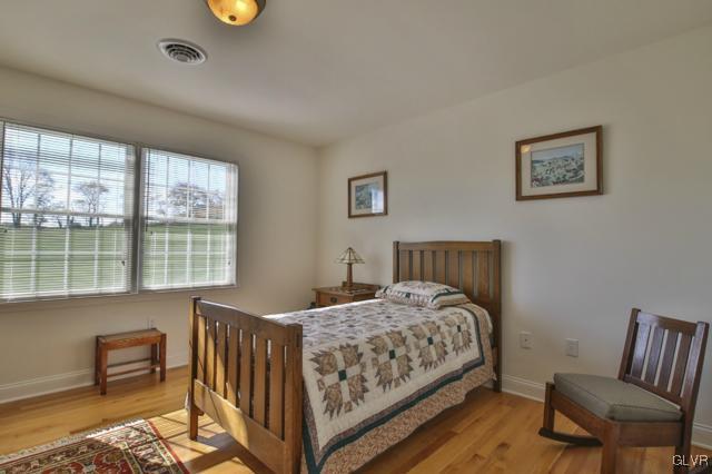 297 Meyer Road Nazareth, PA 18064 - Photo 30 of 41 a bedroom with a bed and a window