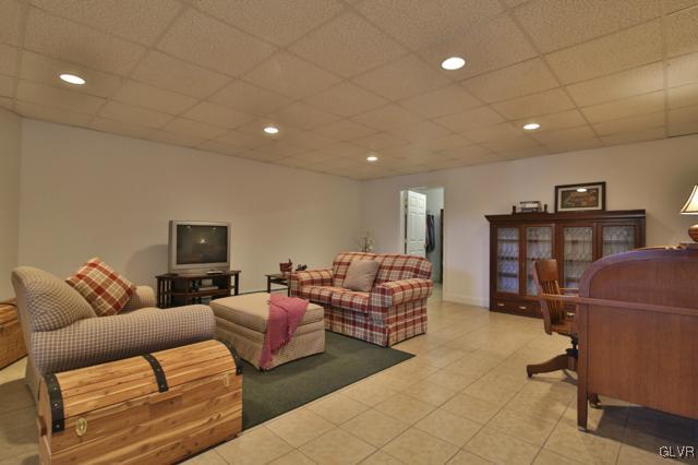 297 Meyer Road Nazareth, PA 18064 - Photo 34 of 41 a living room with furniture and a flat screen tv