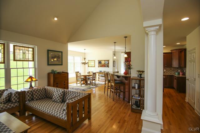 297 Meyer Road Nazareth, PA 18064 - Photo 7 of 41 a living room with furniture wooden floor and a large window