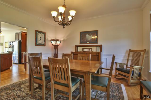 297 Meyer Road Nazareth, PA 18064 - Photo 10 of 41 a view of a dining room with furniture and wooden floor