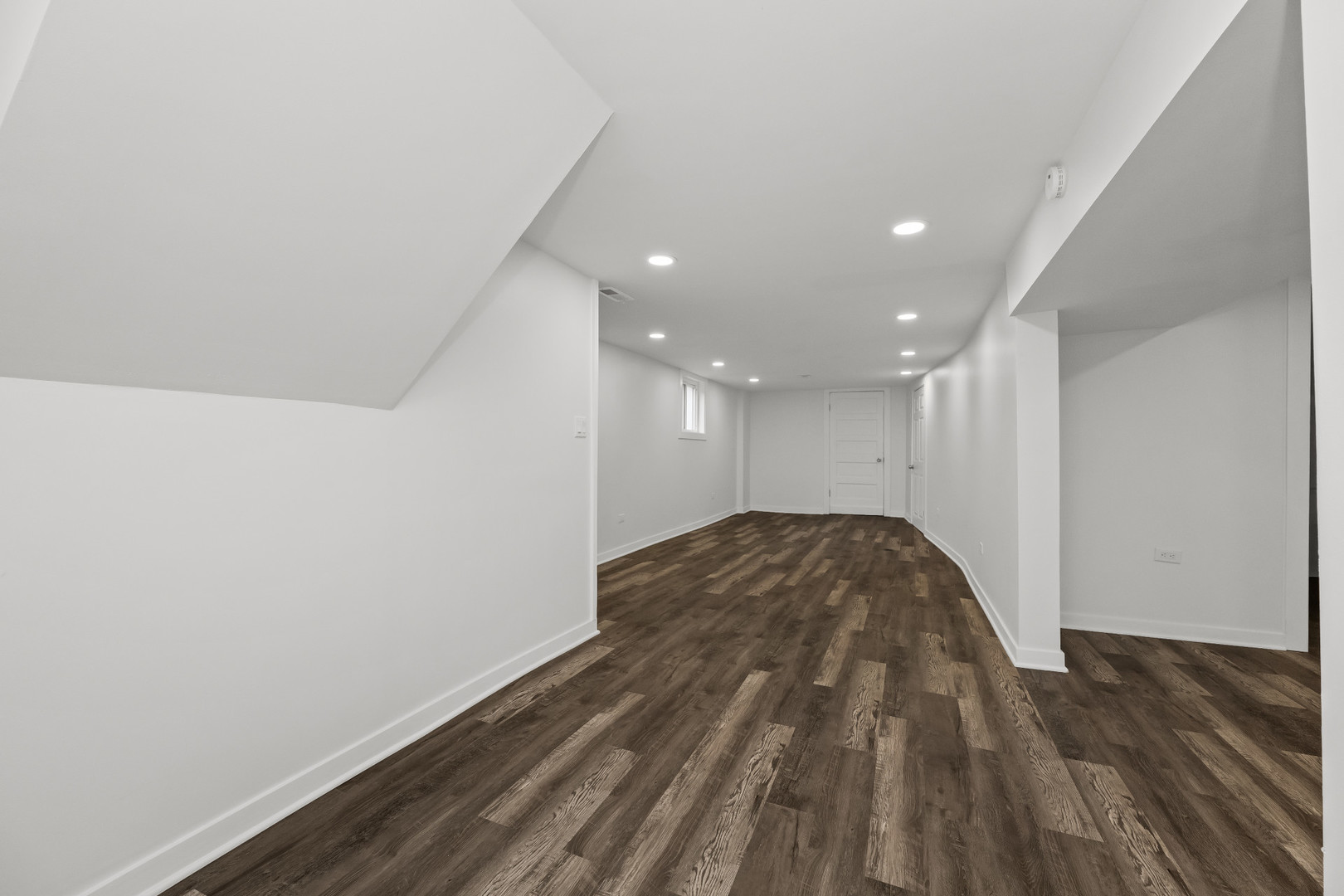 7832 South Paxton Avenue Chicago, IL 60649 - Photo 44 of 59 a view of hallway with wooden floor